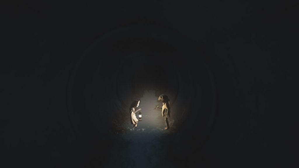 An image of the Boy and Girl from REANIMAL standing in a pool of light emanating from their respective lights.